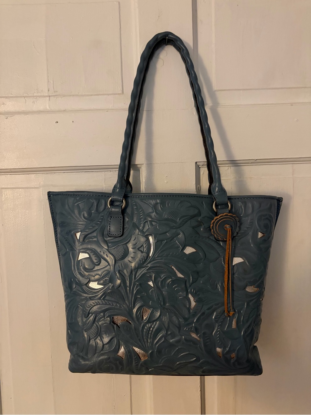 Embossed Floral Leather Tote in Teal with Tassel Accent
